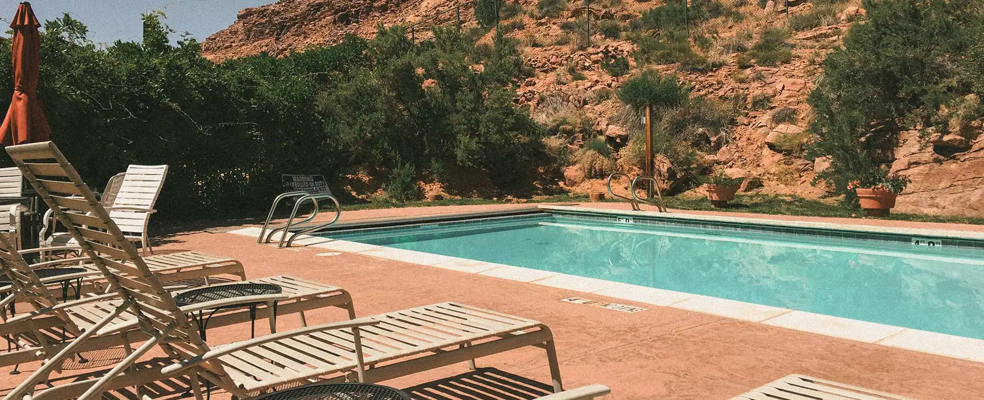 Outdoor Pool Red Rock Backdrop