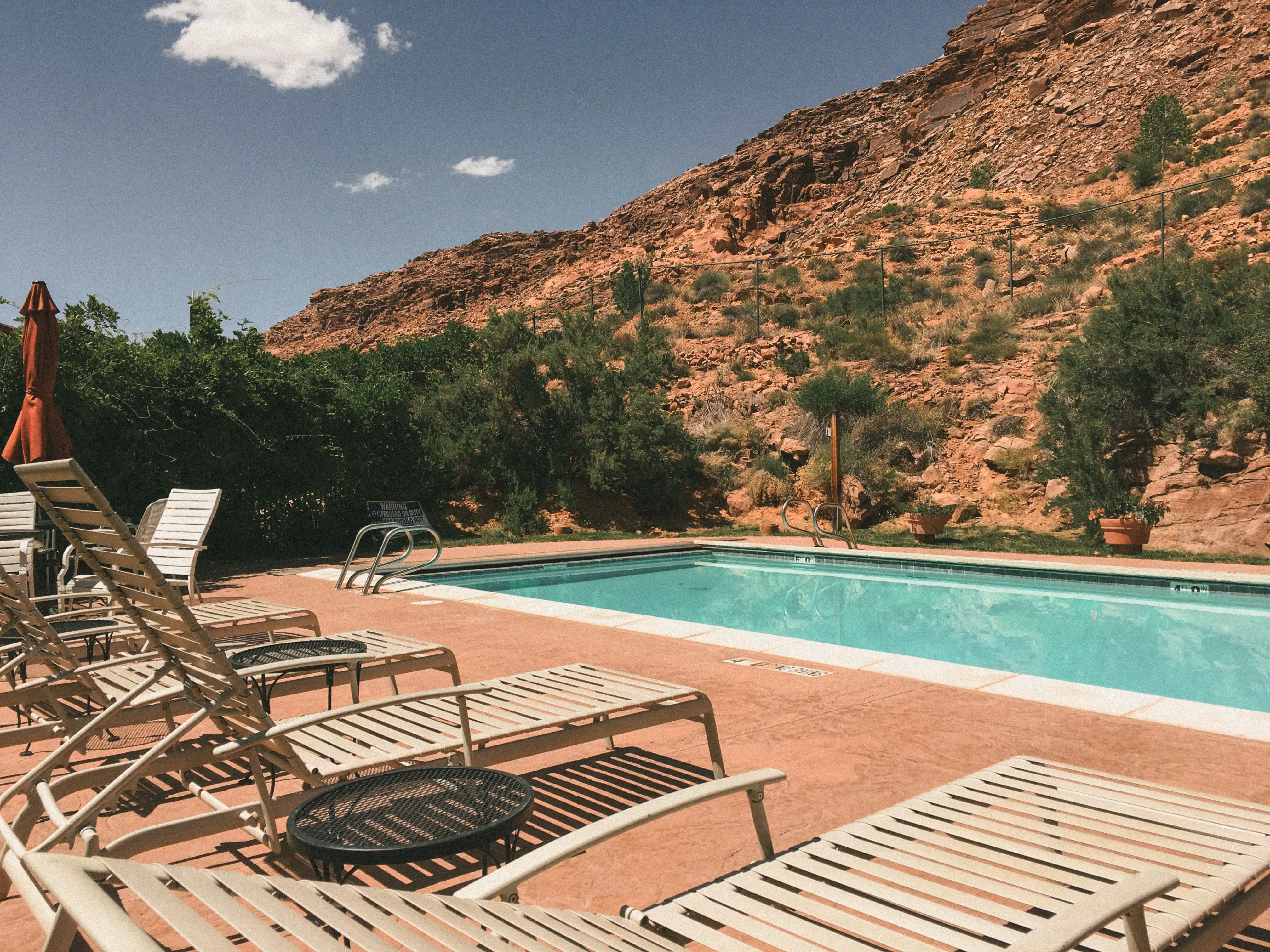 Outdoor Pool Red Rock Backdrop